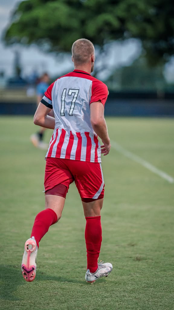 Soccer player practicing on the field